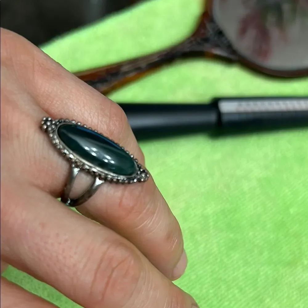 Elegant Silver and Green Oval Ring